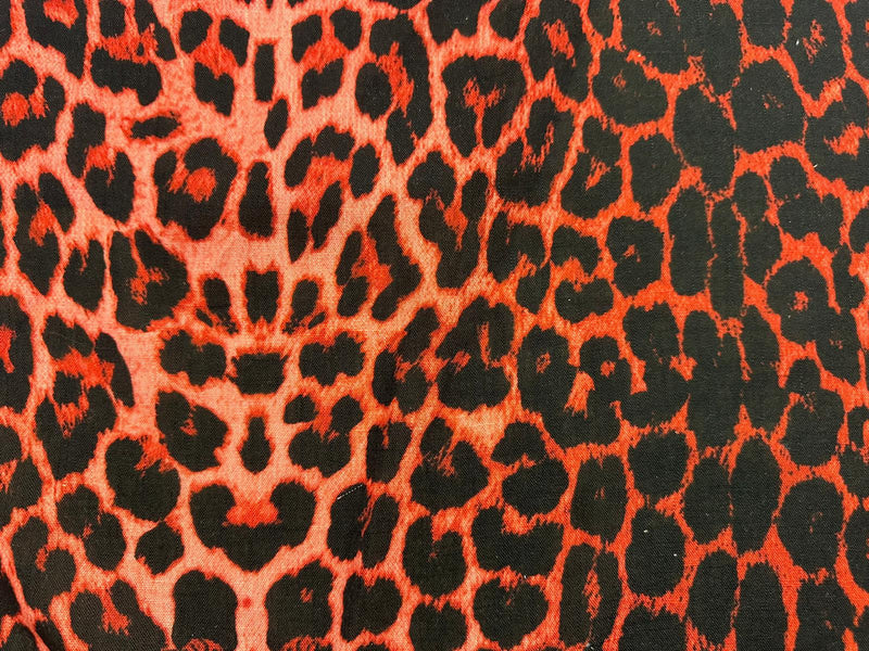 Close-up of a red and black leopard print pattern