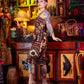 Woman with tattoos standing in a colorful bar setting