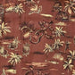 Hawaiian rayon fabric with tropical patterns on a brown background with gold accents