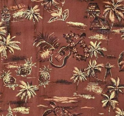 Hawaiian rayon fabric with tropical patterns on a brown background with gold accents